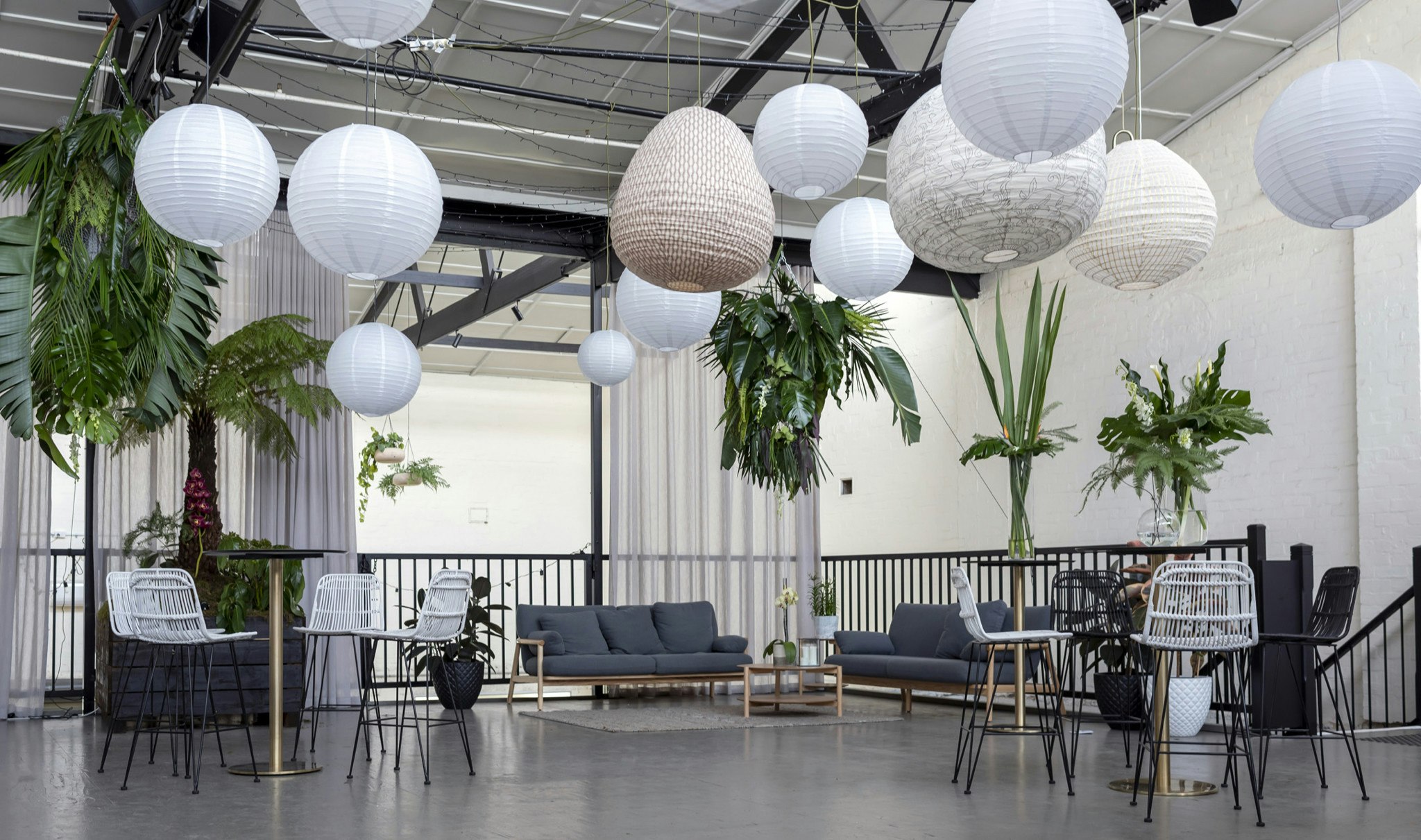 Wedding reception seating and lighting styled.